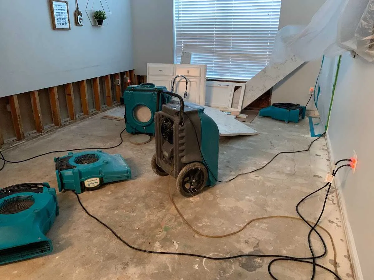 Dehumidifier in flood-cut room for Water Damage Restoration in North Canton